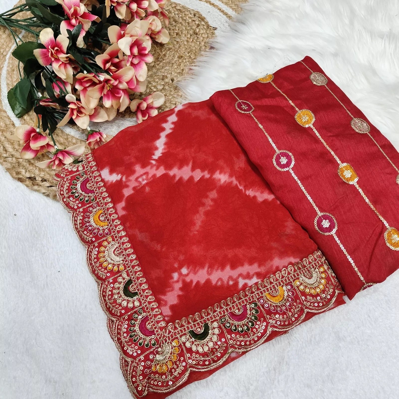 Soft Georgette Sari With Bhandhej Print And Designer Sari & Blouse